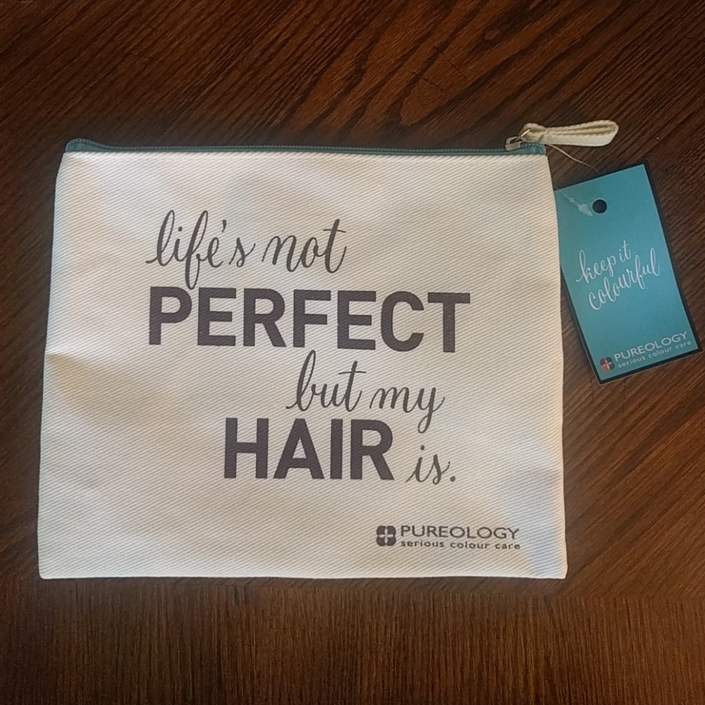 Life's not perfext but my hair is cosmetics bag